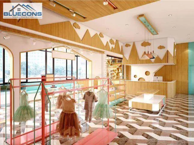 Không gian thiết kế cửa hàng thời trang trẻ em tạo sự thông thoáng, rộng rãi
