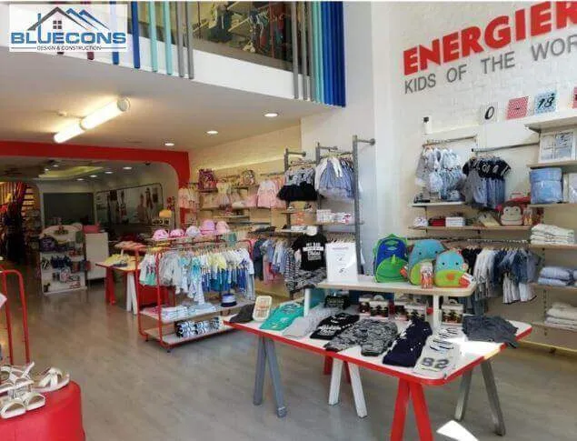 Mẫu thiết kế cửa hàng thời trang trẻ em đẹp, cân đối, hài hòa và thu hút