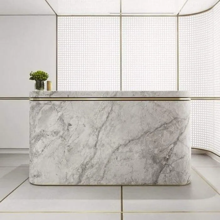 quầy lễ tân đẹp bằng đá hoa cương bo tròn cạnh độc đáo