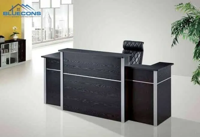 Mẫu thiết kế thi công quầy lễ tân chữ L đen sang trọng