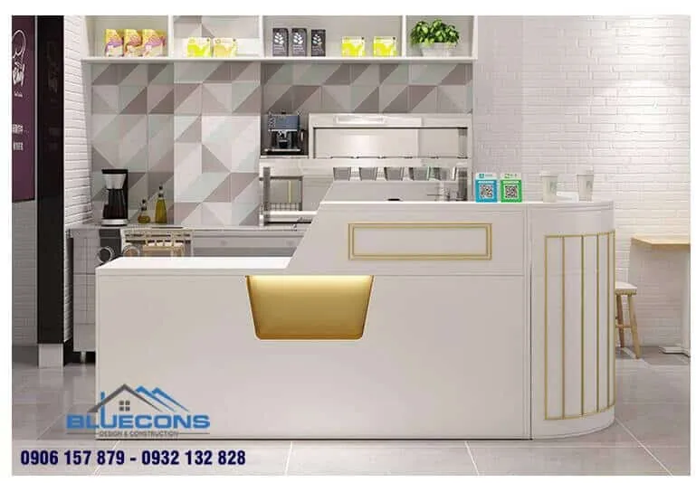 Mẫu quầy chữ L tone trắng kết hợp họa tiết màu vàng đặc sắc